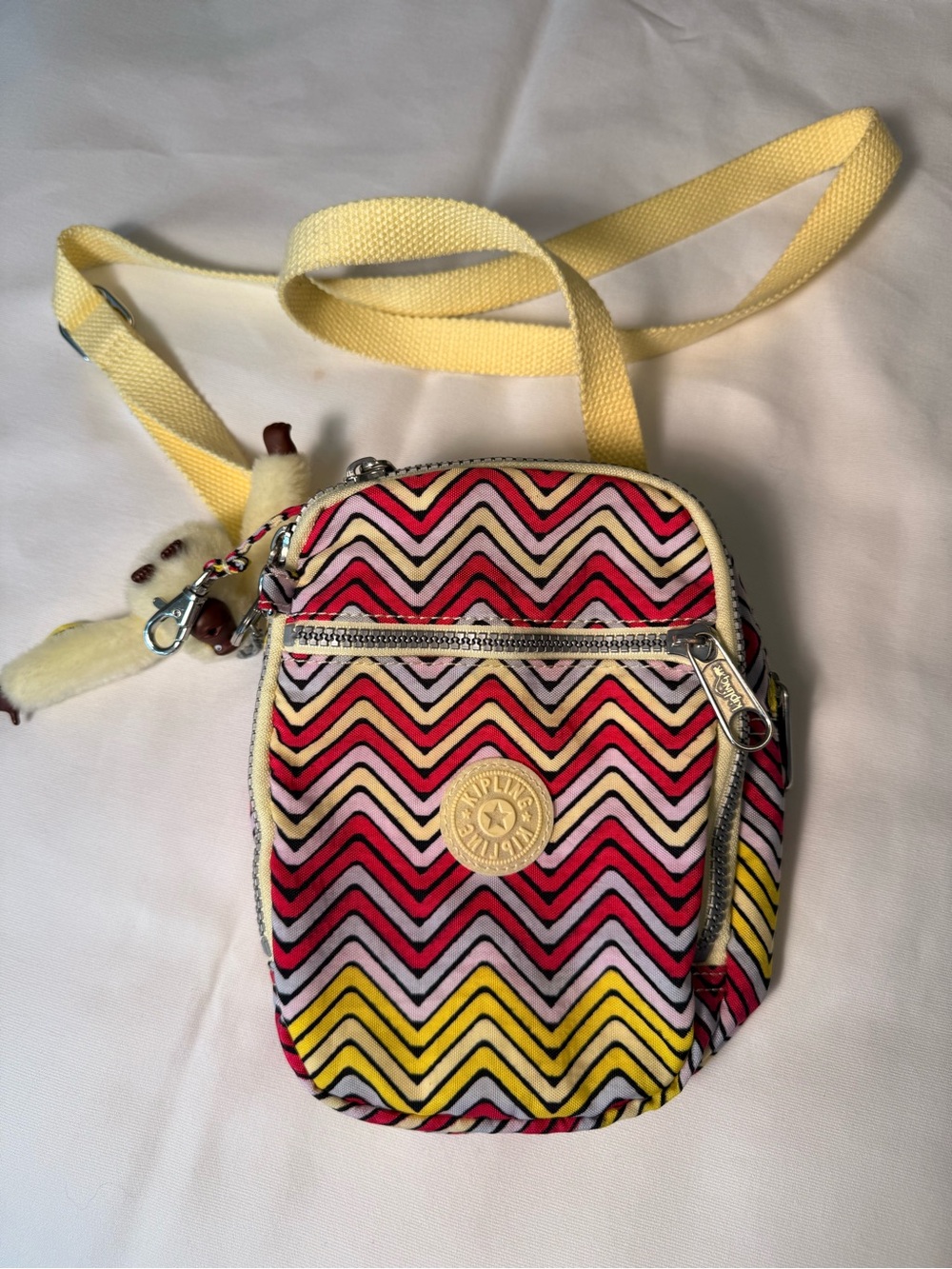 Kipling Zigzag Chevron Crossbody in Yellow, Pink and Red